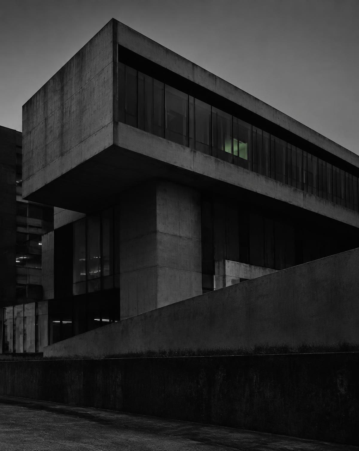 Concrete corporate architecture at dusk